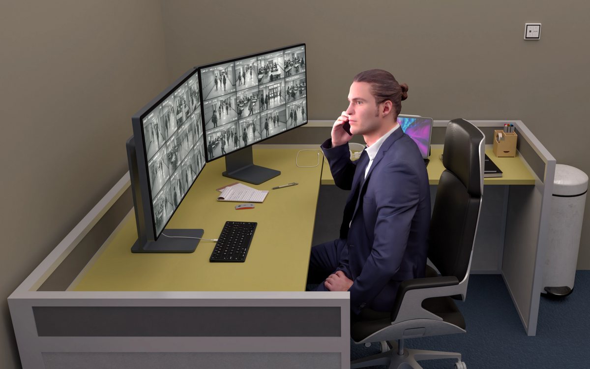Operator at a video surveillance monitoring desk